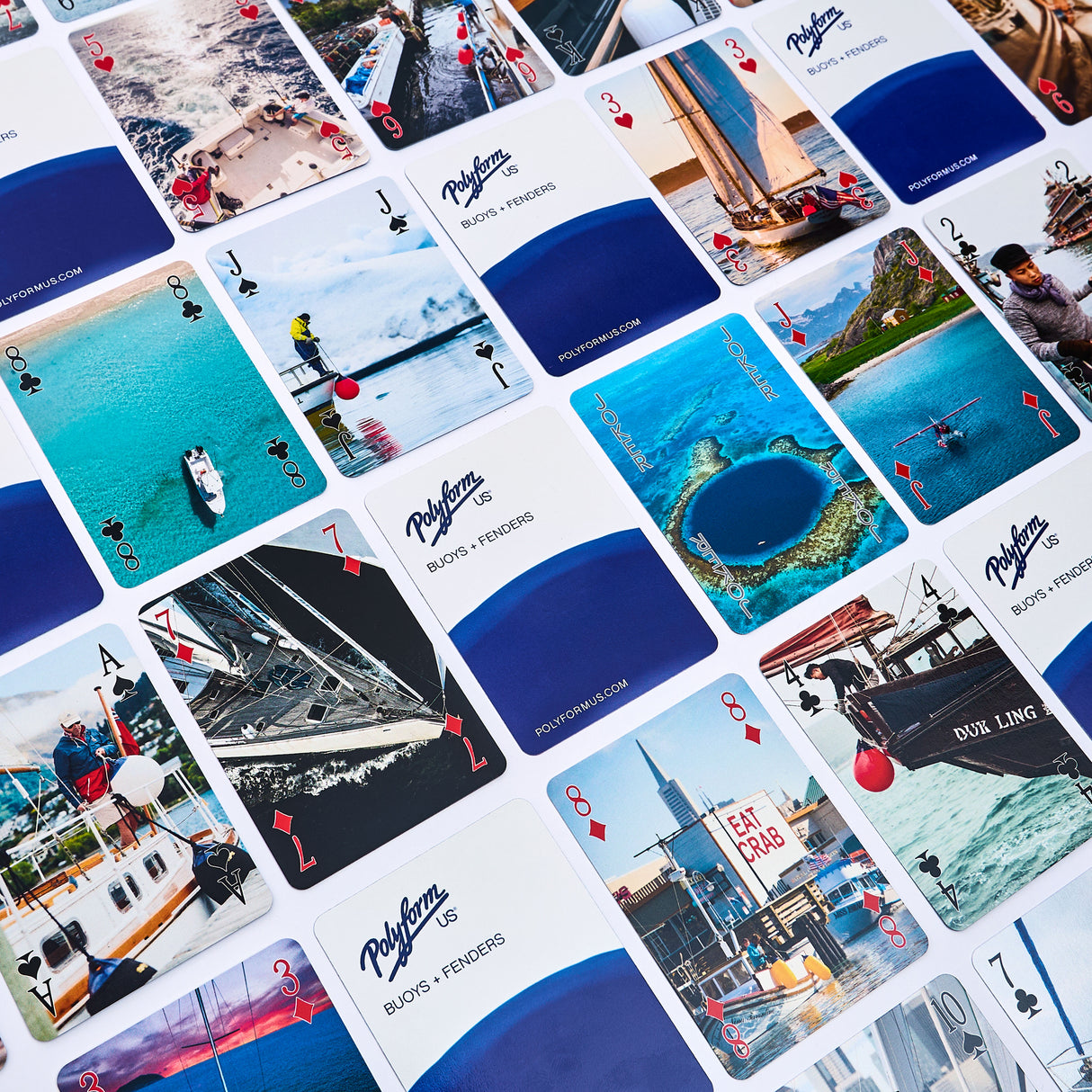 Collection of playing cards with various images showing Polyform US products in use around the world