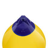 Yellow inflatable buoy, Polyform A-6 angled shot